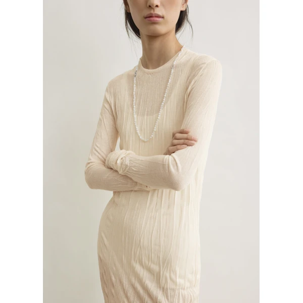 Toteme Dresses with minimalist design at Coveti