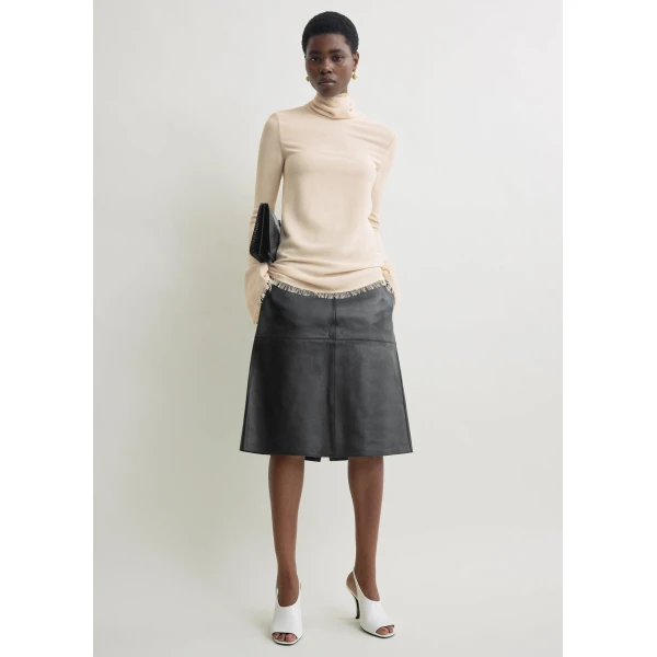 Toteme Tops with minimalist design at Coveti