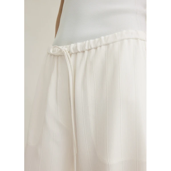 Toteme Pants with minimalist design at Coveti