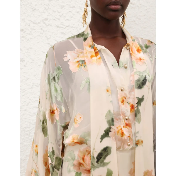 Elevate your elegance in this Zimmermann Tops available now at Coveti