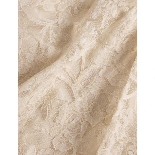 Elevate your elegance in this Zimmermann Tops available now at Coveti