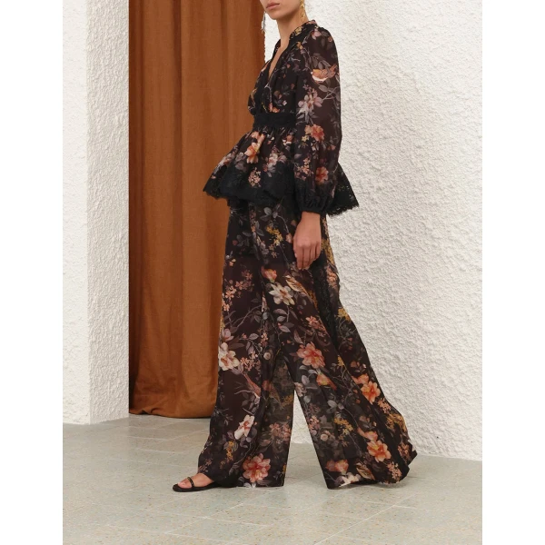 Elevate your elegance in this Zimmermann Tops available now at Coveti