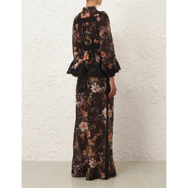 Elevate your elegance in this Zimmermann Tops available now at Coveti