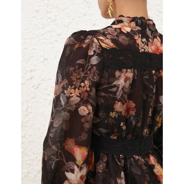 Elevate your elegance in this Zimmermann Tops available now at Coveti