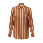 Elevate your elegance in this Zimmermann Tops available now at Coveti