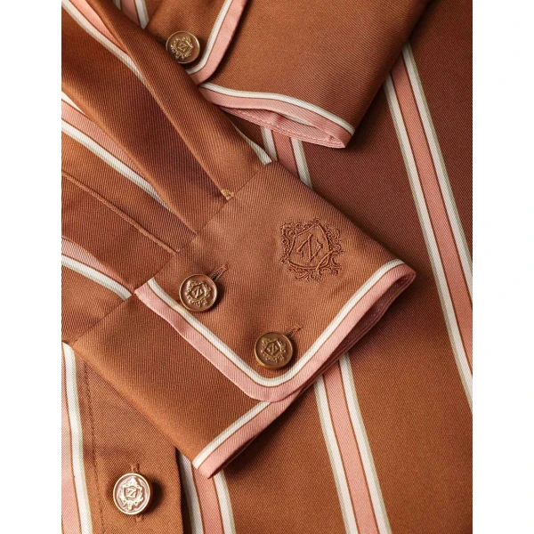 Elevate your elegance in this Zimmermann Tops available now at Coveti