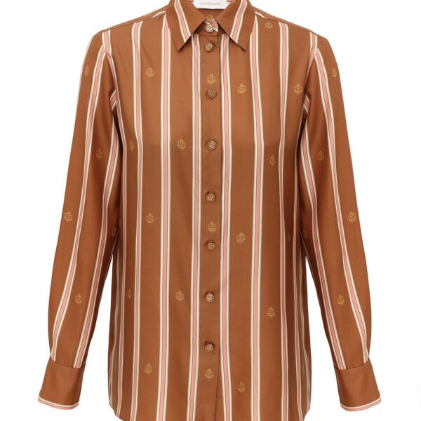 Elevate your elegance in this Zimmermann Tops available now at Coveti