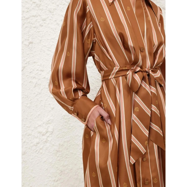 Elevate your elegance in this Zimmermann Dresses available now at Coveti