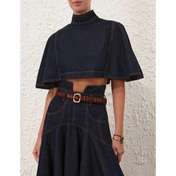 Elevate your elegance in this Zimmermann Tops available now at Coveti