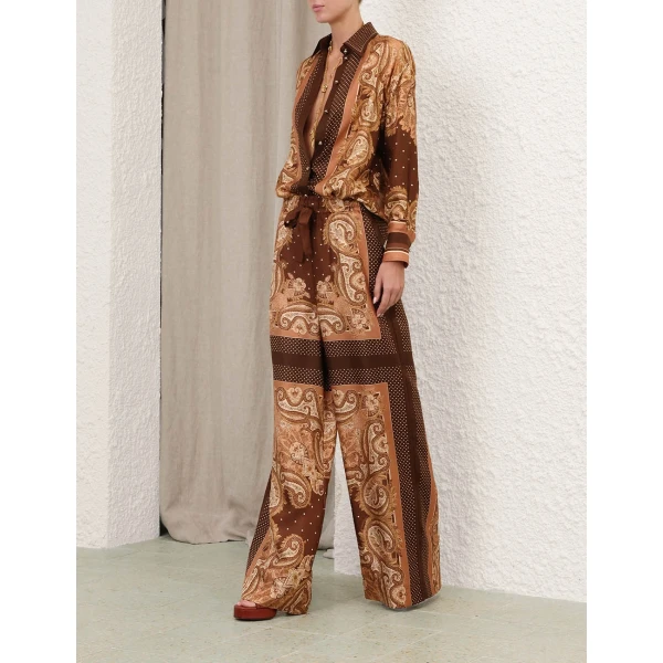 Elevate your elegance in this Zimmermann Tops available now at Coveti