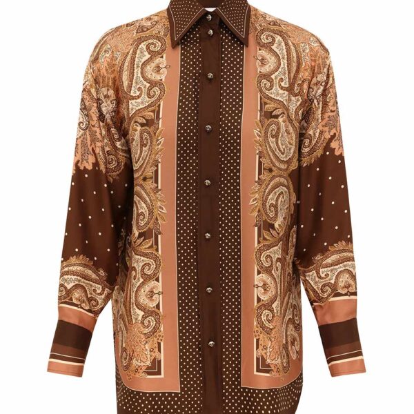 Elevate your elegance in this Zimmermann Tops available now at Coveti