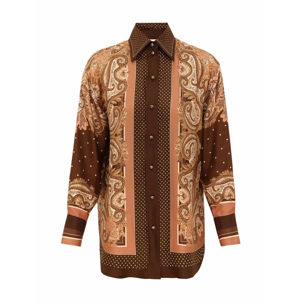 Elevate your elegance in this Zimmermann Tops available now at Coveti