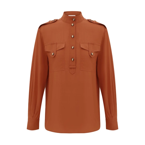 Elevate your elegance in this Zimmermann Tops available now at Coveti