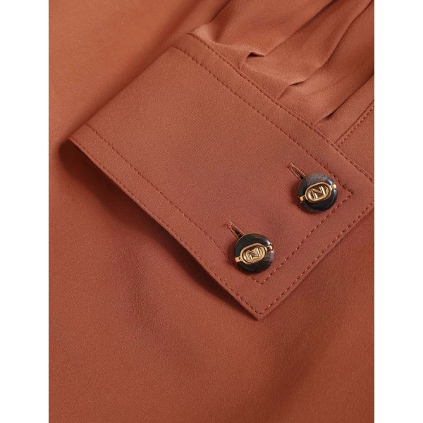 Elevate your elegance in this Zimmermann Tops available now at Coveti