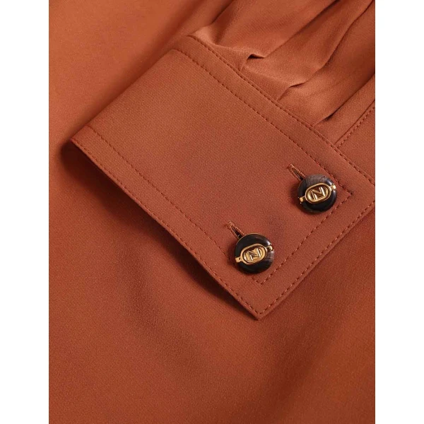 Elevate your elegance in this Zimmermann Tops available now at Coveti