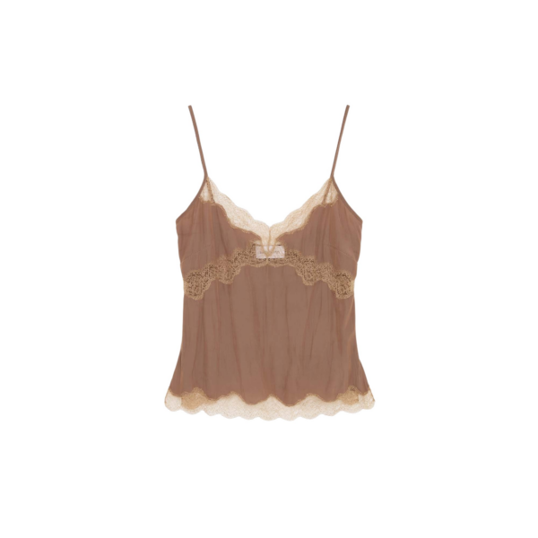 Elevate your elegance in this 16Arlington Tops from the luxury feather dress edit