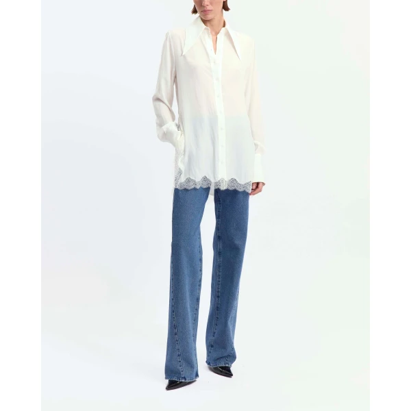 Elevate your elegance in this 16Arlington Tops from the luxury feather dress edit