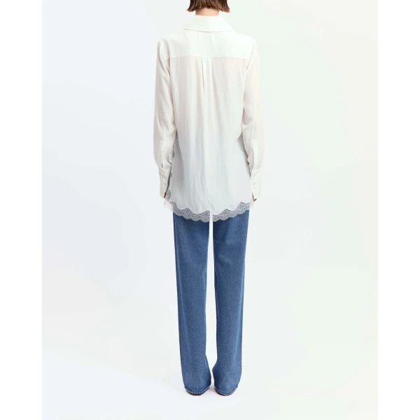 Elevate your elegance in this 16Arlington Tops from the luxury feather dress edit