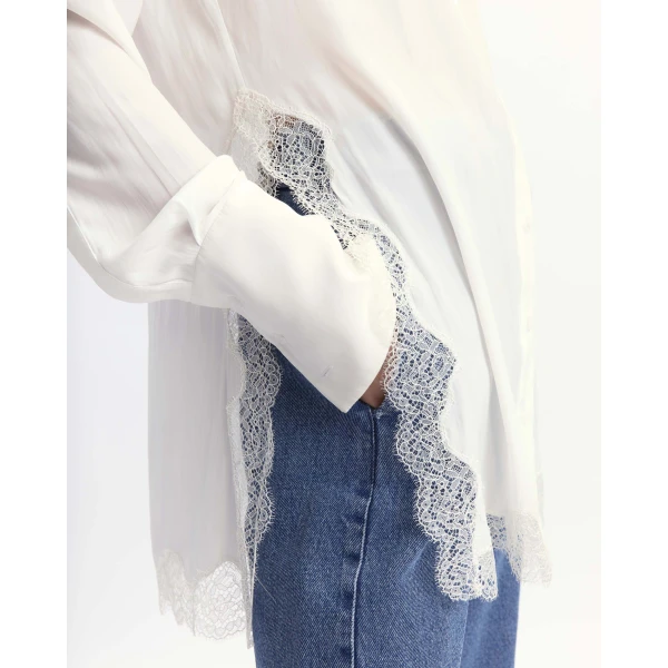 Elevate your elegance in this 16Arlington Tops from the luxury feather dress edit