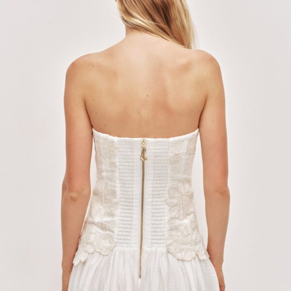 Aje Aus Dresses – structured silhouette with raw femininity from Coveti