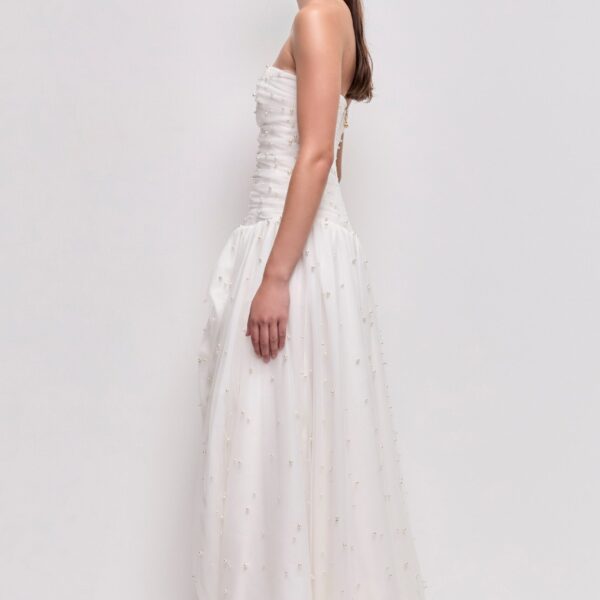 Aje Aus Dresses – structured silhouette with raw femininity from Coveti