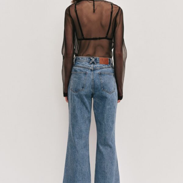 Aje clothing Aus Pants – structured silhouette with raw femininity from Coveti