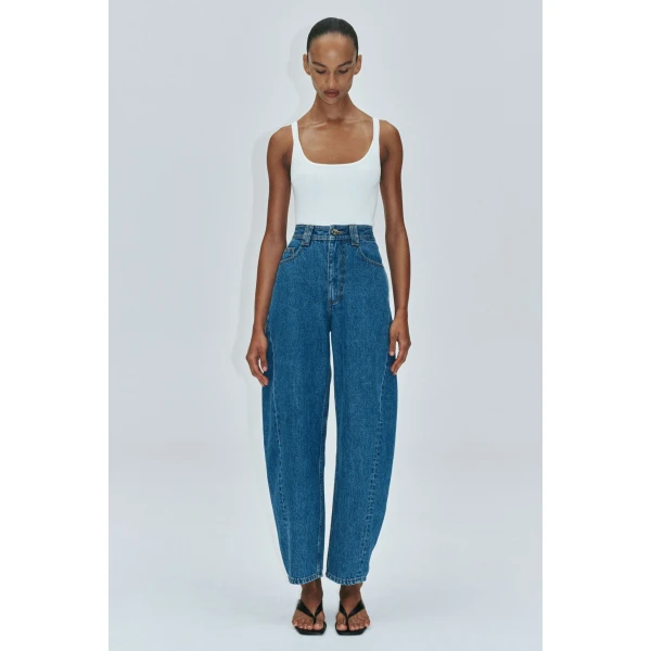 Aje Aus Pants – structured silhouette with raw femininity from Coveti