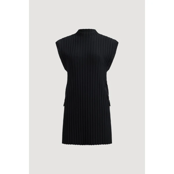 Aje clothing Aus Tops – structured silhouette with raw femininity from Coveti