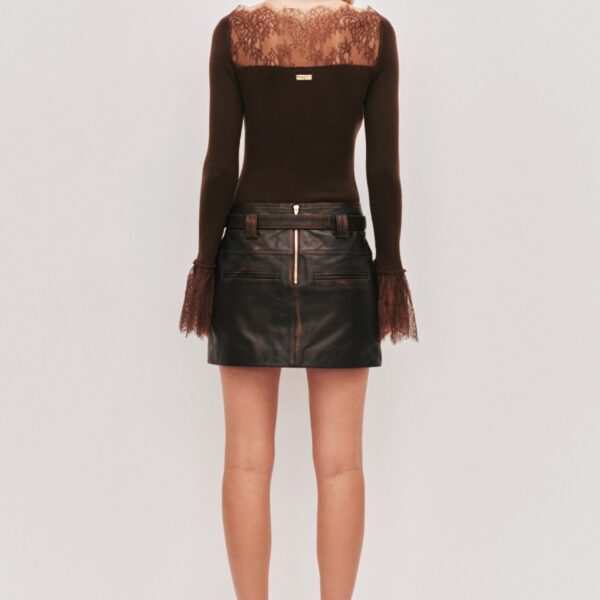 Aje clothing Aus Tops – structured silhouette with raw femininity from Coveti