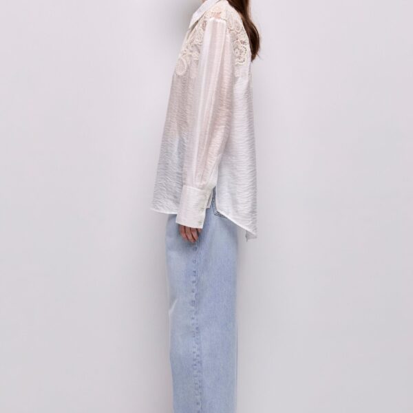 Aje Aus Tops – structured silhouette with raw femininity from Coveti
