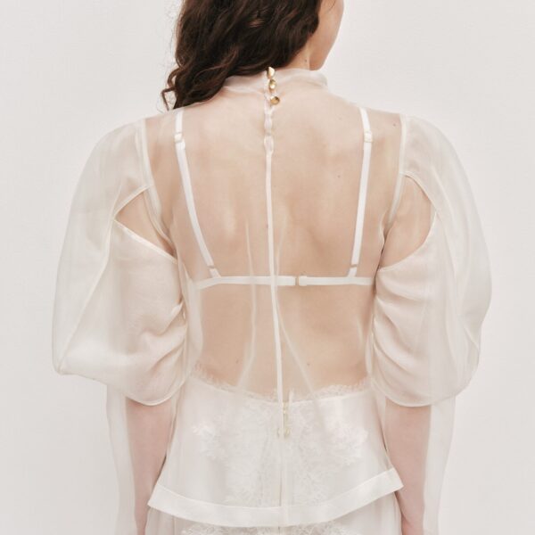 Aje clothing Aus Tops – structured silhouette with raw femininity from Coveti