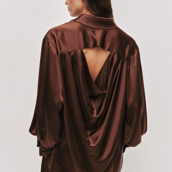 Aje Aus Tops – structured silhouette with raw femininity from Coveti