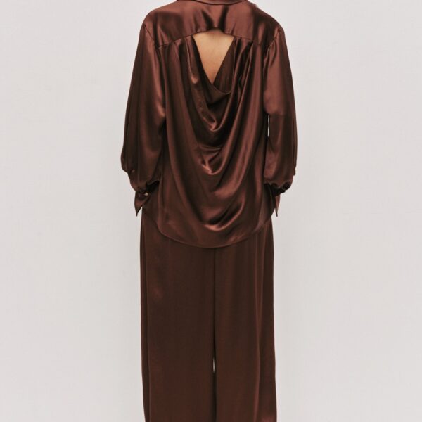 Aje clothing Aus Tops – structured silhouette with raw femininity from Coveti