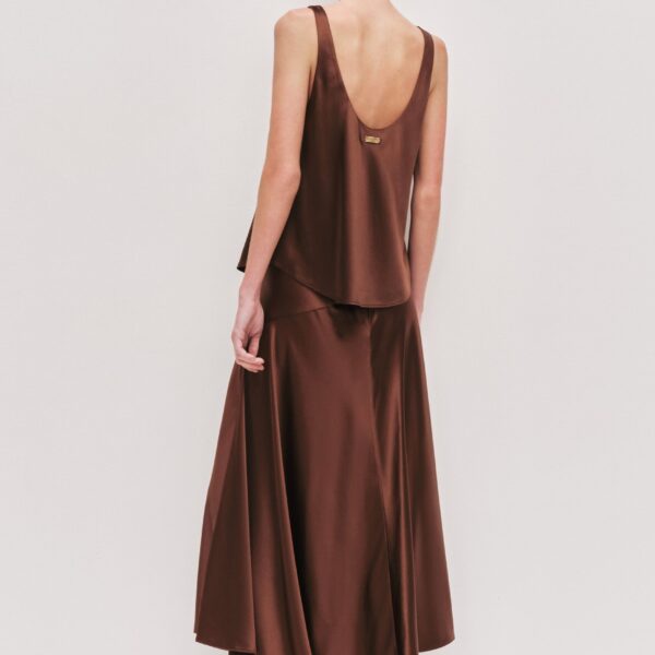 Aje Aus Tops – structured silhouette with raw femininity from Coveti
