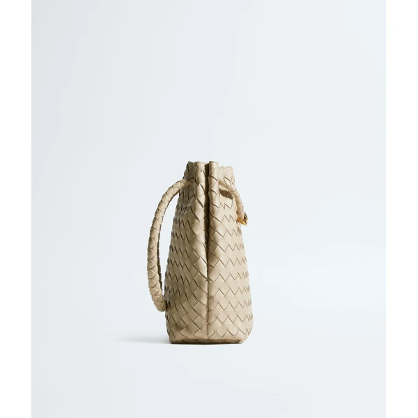 Khaite Women's Andiamo Small Bucket in Ecru - Beige Bucket Bags - The Lotus Tote Bag - Shop at Coveti