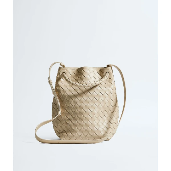 Khaite Women's Andiamo Small Bucket in Ecru - Beige Bucket Bags - The Lotus Tote Bag - Shop at Coveti