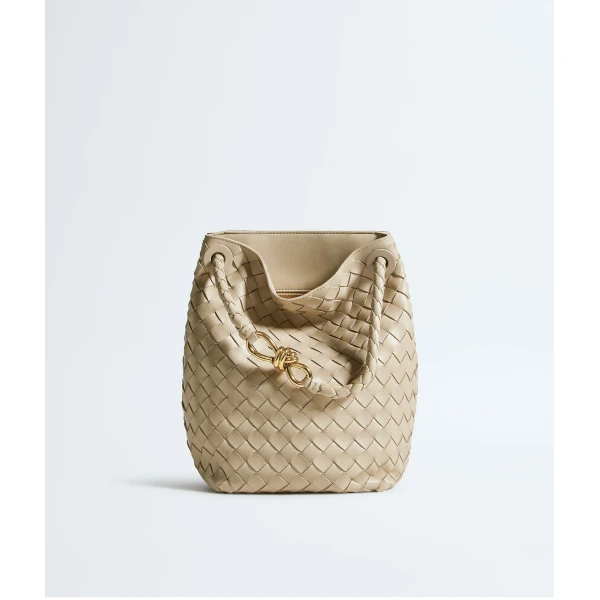 Khaite Women's Andiamo Small Bucket in Ecru - Beige Bucket Bags - The Lotus Tote Bag - Shop at Coveti