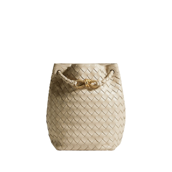 Khaite Women's Andiamo Small Bucket in Ecru - Beige Bucket Bags - The Lotus Tote Bag - Shop at Coveti