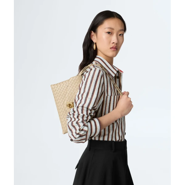 Khaite Women's Knot Lock in Ecru - Beige Clutch Bags - The Lotus Tote Bag - Shop at Coveti