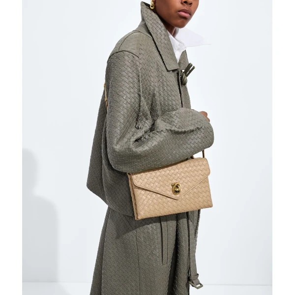 Khaite Women's Knot Lock in Shore - Beige Clutch Bags - The Lotus Tote Bag - Shop at Coveti