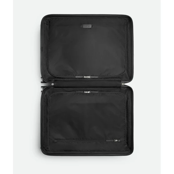 Khaite Odissey Check-In Suitcase in Black - Black  - The Lotus Tote Bag - Shop at Coveti