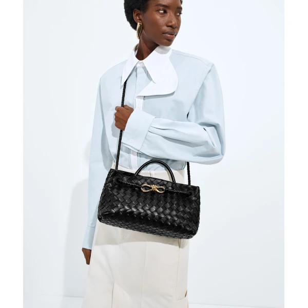 Khaite Women's East-West Andiamo in Black - Black Totes & Top-Handle Bags - The Lotus Tote Bag - Shop at Coveti