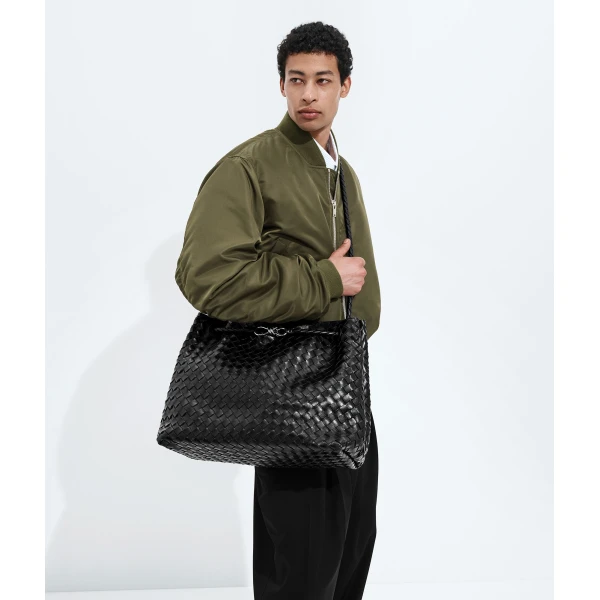 Khaite Women's Large Andiamo in Black - Black Totes & Top-Handle Bags - The Lotus Tote Bag - Shop at Coveti