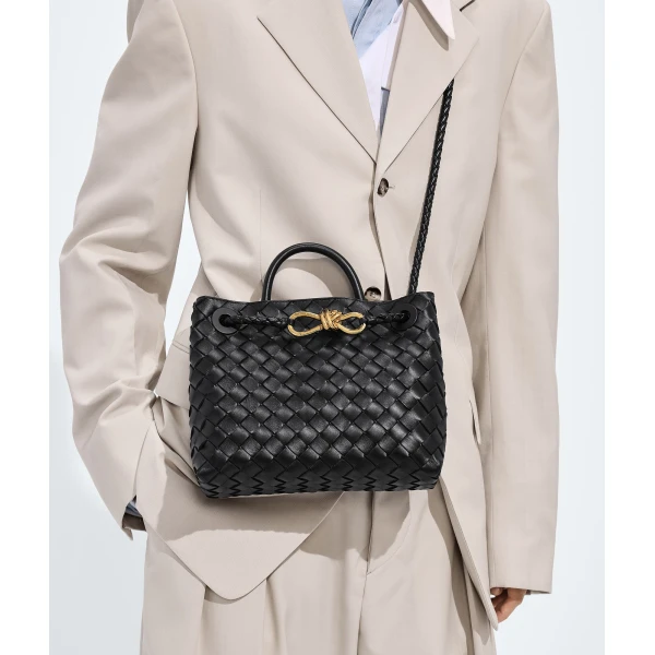 Khaite Women's Small Andiamo in Black - Black Totes & Top-Handle Bags - The Lotus Tote Bag - Shop at Coveti