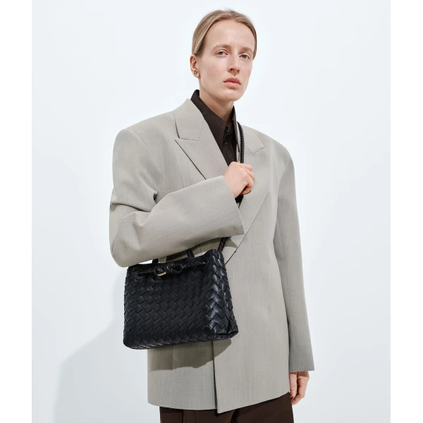 Khaite Women's Small Andiamo in Black - Black Totes & Top-Handle Bags - The Lotus Tote Bag - Shop at Coveti