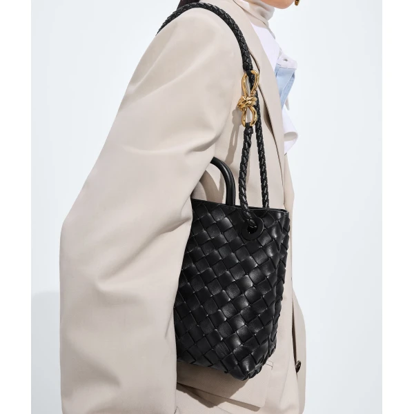 Khaite Women's Small Andiamo in Black - Black Totes & Top-Handle Bags - The Lotus Tote Bag - Shop at Coveti