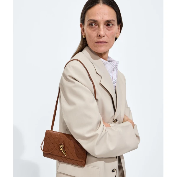 Khaite Women's Andiamo Pouch on Strap in Tannin - Brown Shoulder & Crossbody Bags - The Lotus Tote Bag - Shop at Coveti