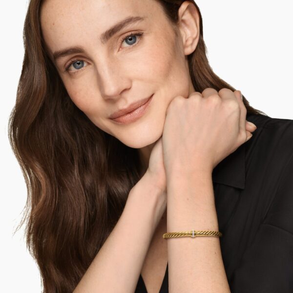 6mm in Gold – front view of authentic Cable Bracelets at Coveti|David Yurman Cablespira® Flex Center Station Bracelet in 18K Yellow Gold with Diamonds