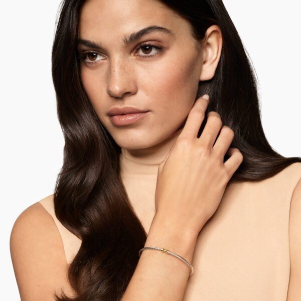 2.6mm in Silver – front view of authentic Cable Bracelets at Coveti|David Yurman Micro Cable Flex® X Bracelet in Sterling Silver with 14K Yellow Gold