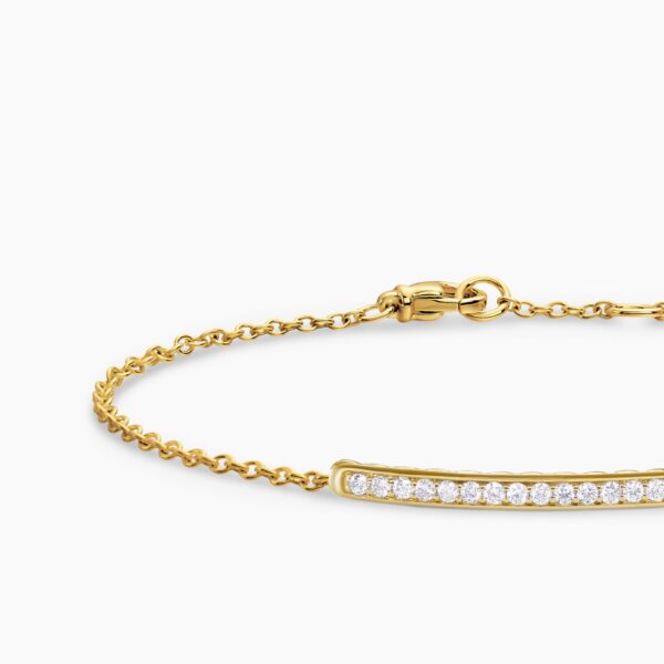 on-model styling shot|David Yurman Petite Pavé Bar Bracelet in 18K Yellow Gold with Diamonds